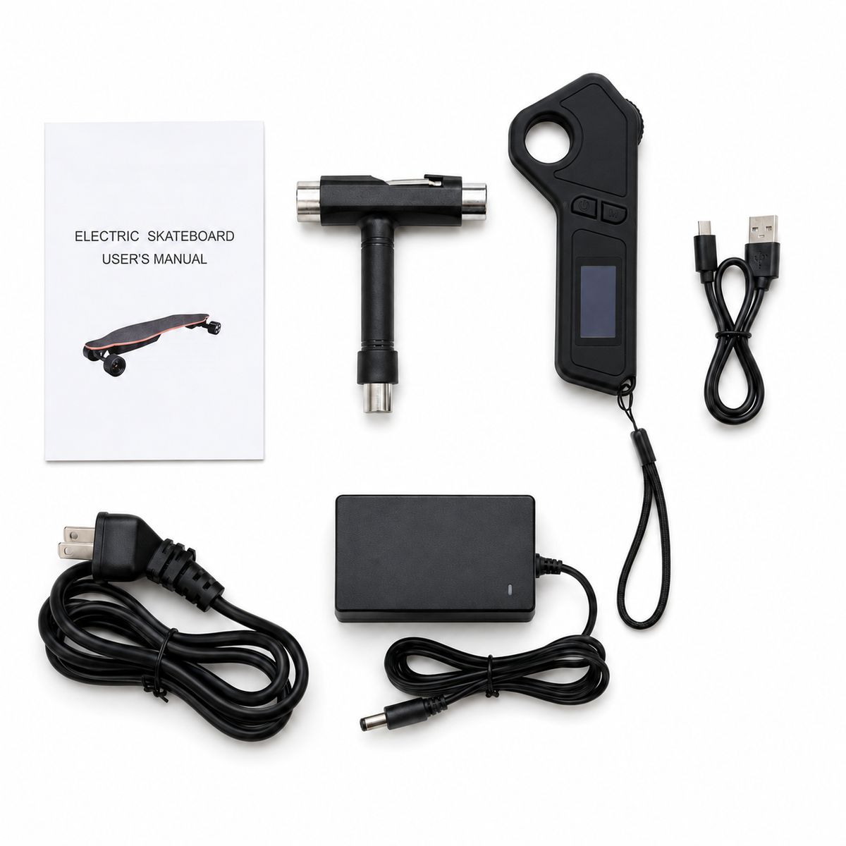 Electric skateboard diagnostic tool kit with a black handheld diagnostic device, T-shaped metal tool, USB-C charging cable, power adapter, power cord, and a white user manual booklet, all arranged on a white background.