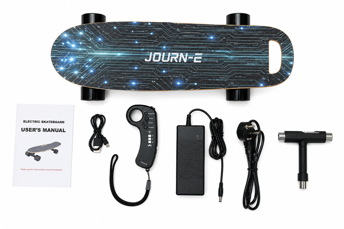 JOURN-E electric skateboard kit laid out on a white background, including the skateboard deck with blue circuit-board graphic, four black wheels, a handheld controller, power adapter, charger, T-handle tool, USB cable, and user manual.