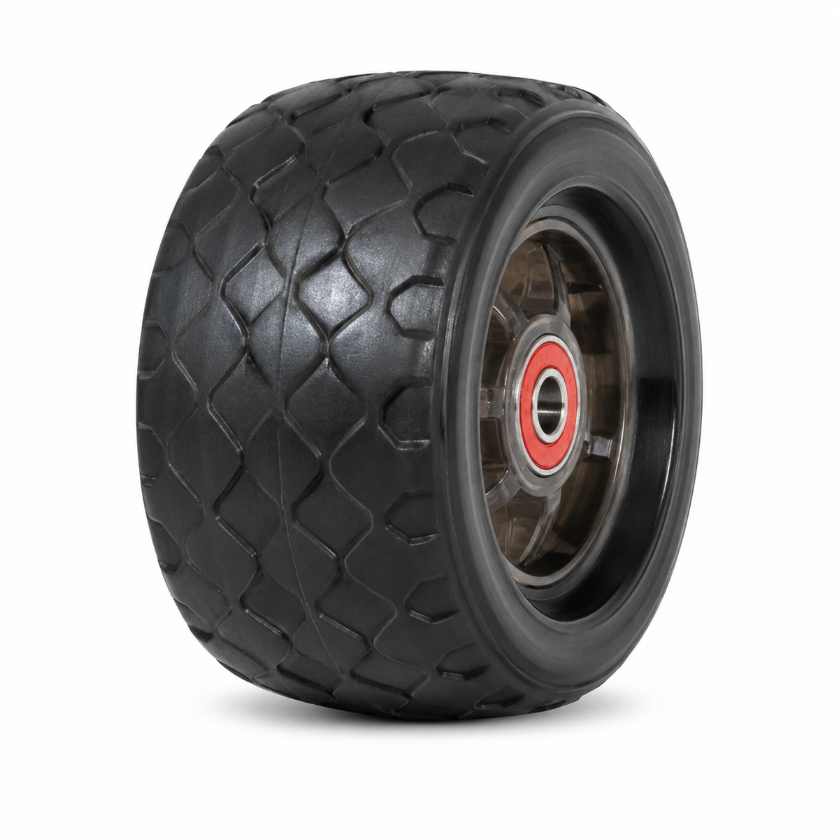 A black rubber Phantom tire mounted on a dark metal wheel with a red and silver center bearing, shown on a white background.